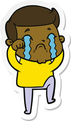 sticker of a cartoon man crying