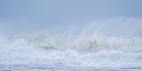 crashing waves off chapel Porth beach cornwall england uk 