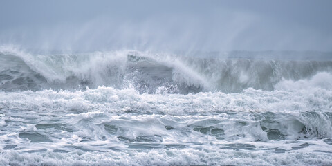crashing waves off chapel Porth beach cornwall england uk 