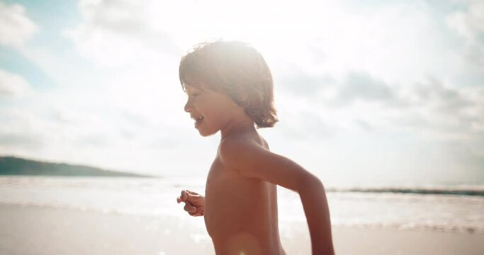 Happy little dreamer boy run and look back with smile and laughter