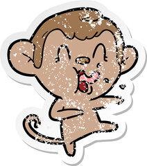 distressed sticker of a crazy cartoon monkey dancing