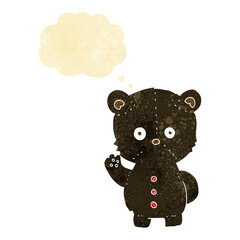 cartoon black bear cub with thought bubble