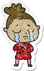 distressed sticker of a cartoon crying woman