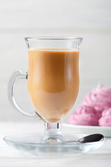 Homemade fruit marshmallows with a cup of coffee with milk