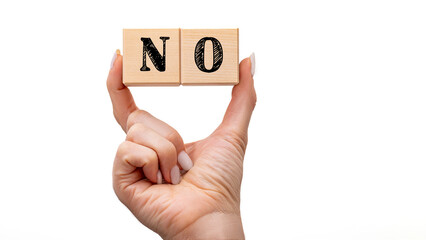 Wooden cubes with text no on a red background. Negative answer concept. No risk, no violence or no discrimination concept.