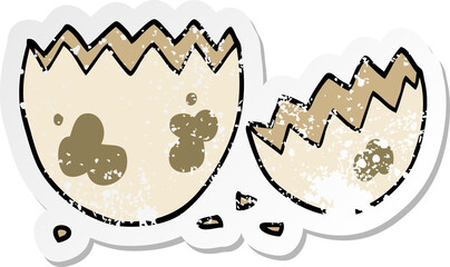 distressed sticker of a cartoon cracked egg