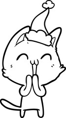happy line drawing of a cat wearing santa hat
