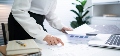 Auditor or internal revenue service staff, Business women checking annual financial statements of...