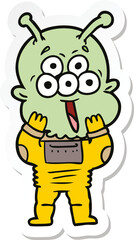 sticker of a happy cartoon alien