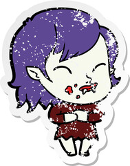 distressed sticker of a cartoon vampire girl with blood on cheek