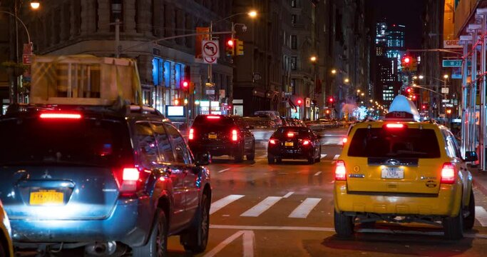 Lockdown Time Lapse Shot Of Vehicles Moving On Illuminated Street In City At Night - New York City, New York