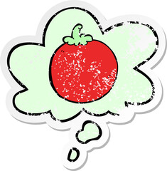 cartoon tomato and thought bubble as a distressed worn sticker