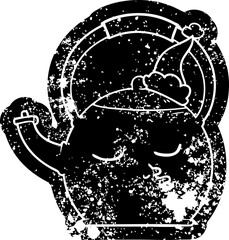 cartoon distressed icon of a kettle wearing santa hat