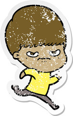 distressed sticker of a cartoon angry boy