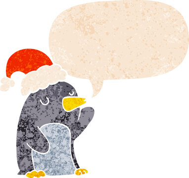cute cartoon christmas penguin and speech bubble in retro textured style
