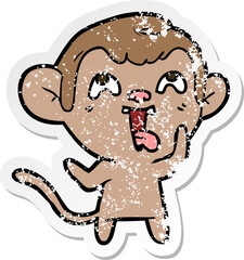 distressed sticker of a crazy cartoon monkey