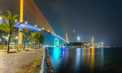 Colorful night view of Bai Chay Bridge, connecting two parts of Ha Long City, Hon Gai City and Bai Chay City through Cua Luc Bay.