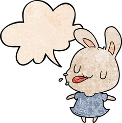 cute cartoon rabbit blowing raspberry and speech bubble in retro texture style