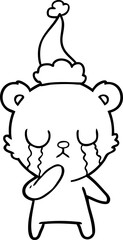 crying polar bear line drawing of a wearing santa hat