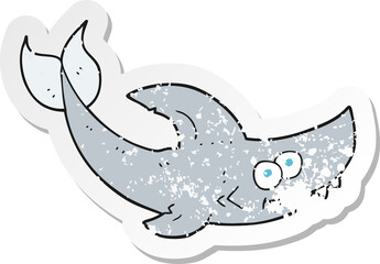 retro distressed sticker of a cartoon shark