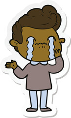 sticker of a cartoon man crying