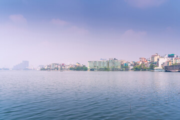 Fototapeta premium West lake and Truc Bach lake in foggy morning, Hanoi city, Vietnam. Travel and landscape concept.