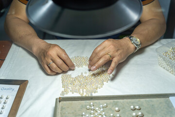 A pearl farm in operation in Ha Long city, Vietnam. Pearls are grown at this pearl farm. This process can take up to ten years.