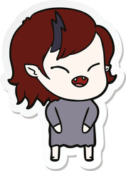 sticker of a cartoon laughing vampire girl