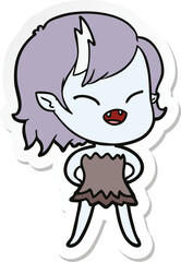 sticker of a cartoon laughing vampire girl