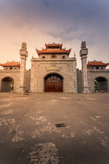 Fototapeta premium Main gate of Hung King Temple, Phu Tho Province, Vietnam. Text on gate in English meaning Hung King temple.