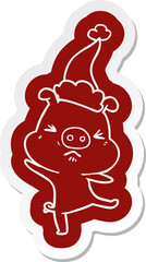 cartoon  sticker of a furious pig wearing santa hat