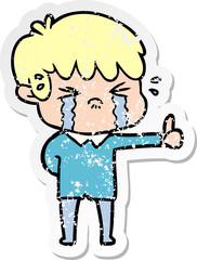 distressed sticker of a cartoon boy crying