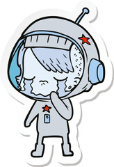 sticker of a cartoon crying astronaut girl