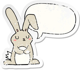 cartoon rabbit and speech bubble distressed sticker