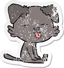 distressed sticker of a cartoon dog sticking out tongue