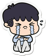 sticker of a cartoon boy crying