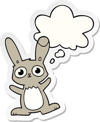 cute cartoon rabbit and thought bubble as a printed sticker