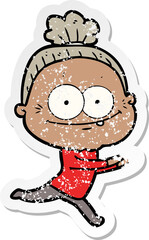 distressed sticker of a cartoon happy old woman