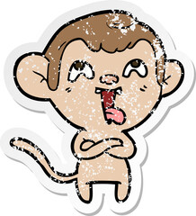 distressed sticker of a crazy cartoon monkey