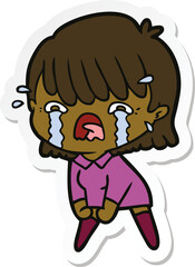 sticker of a cartoon girl crying