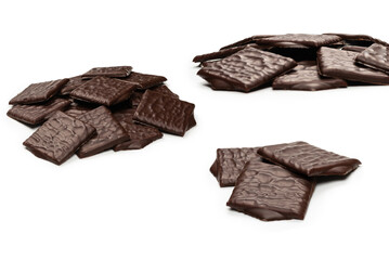 Dark chocolate candies isolated on white background.