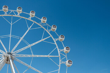 The ferris wheel at the Mallorca fair in Spain. with a blue sky