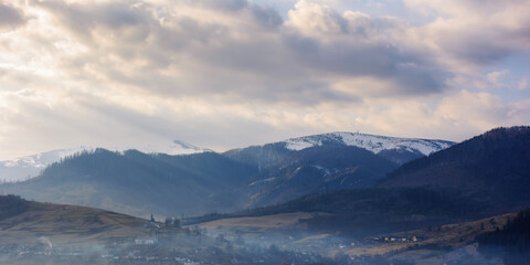 Fototapeta na wymiar beautiful rural landscape on a misty early spring morning. travel background