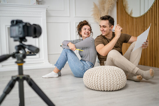 artist couple making video blog or course record instruction on camera