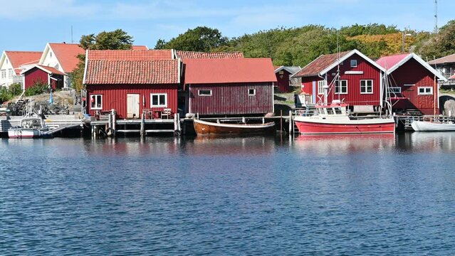 Typical scandinavian buildings on the coast side on the Swedish island of Koster