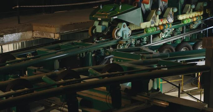 Close-up of slide rails in amusement park. Trailer rides on rails in attraction