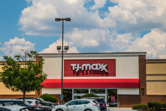 T.J. maxx retail store exterior view from the parking lot of the entrance and sign