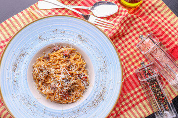 details of delicious carbonara pasta with black pepper