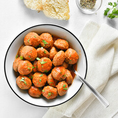 Meatballs with tomato sauce in bowl