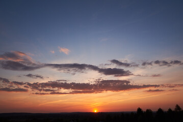 Obraz premium Sky with clouds, with the setting sun.